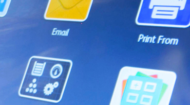 Multifunction printer's user interface with app icons.